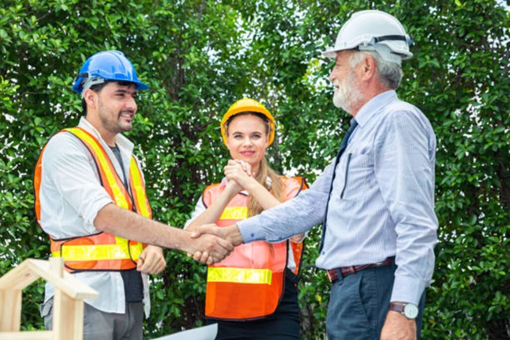 Tree trimming and pruning service in North Royalton with a professional crew carefully cutting tree branches near a residential property.